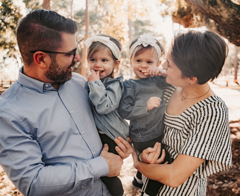 Kline's RV Center current owner Derek Kline and his wife Loren Kline holding their two daughters.